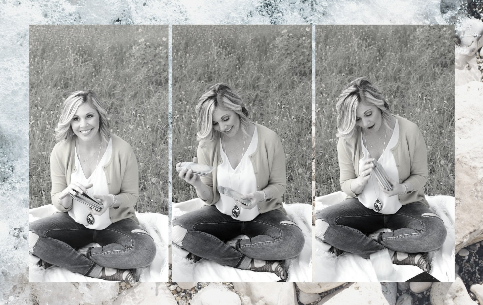 Carrie at Carried by Spirit shuffling oracle cards smiling, looking at the deck, surprised by the deck